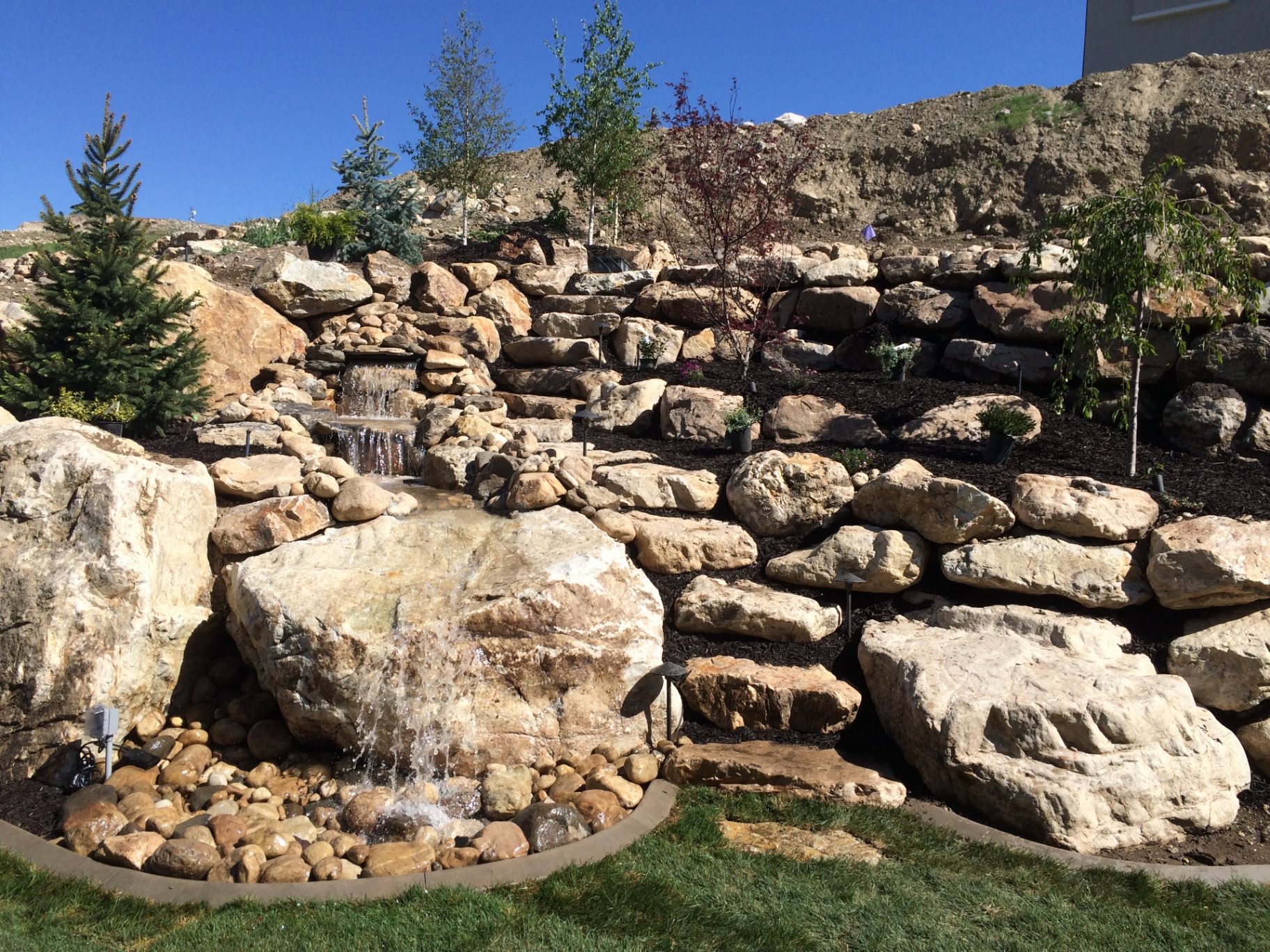 Boulder waterfall water feature