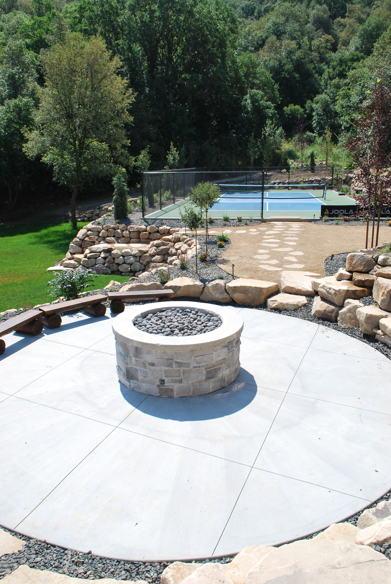 Finished fire pit patio and sport court project